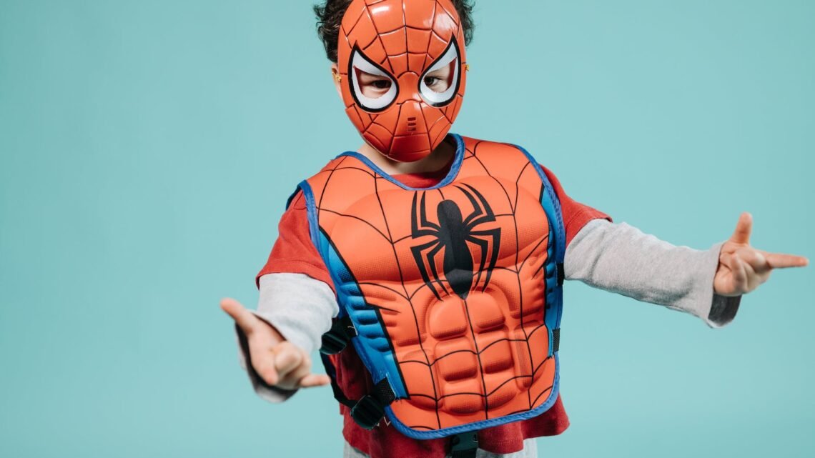 boy wearing a red costume